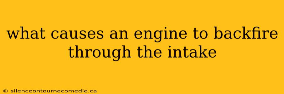what causes an engine to backfire through the intake